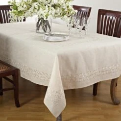 SARO 67 X 120 In. Rectangular Embroidered Swirl Design Linen Blend Tablecloth - Natural